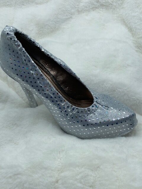 silver shoe cover with polka dots